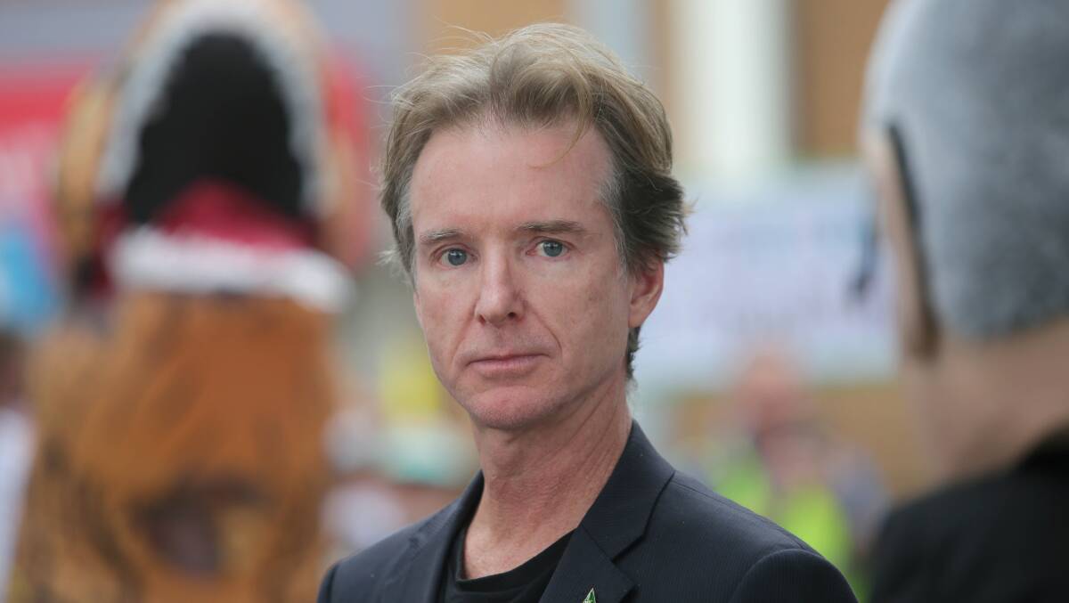 Jonathan Doig at a climate change rally outside Scott Morrison's electorate office.
Picture: John Veage
