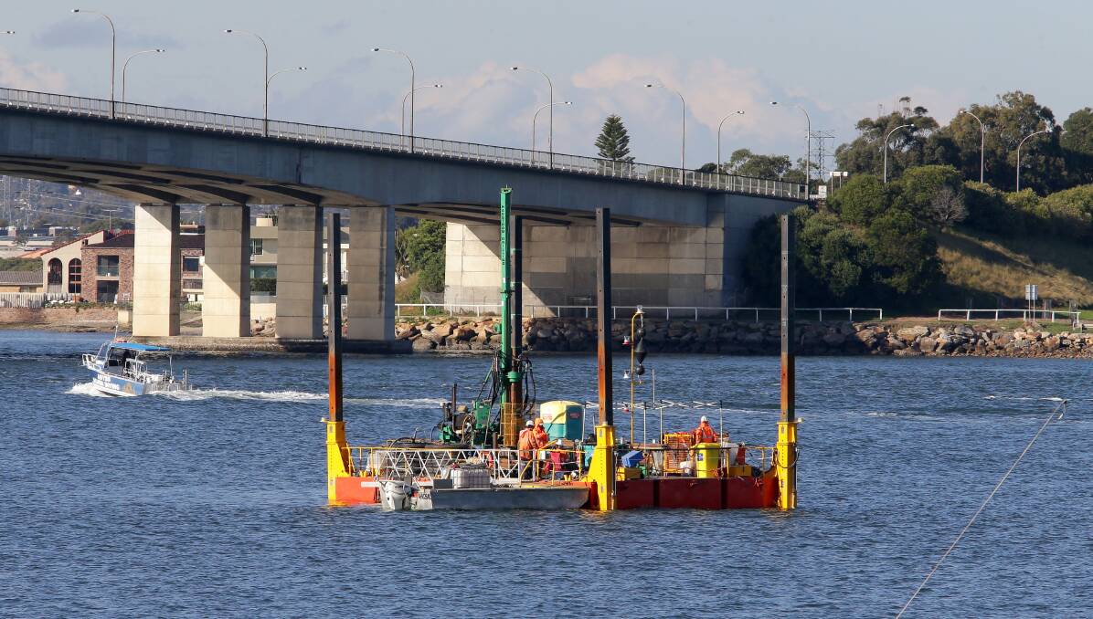 F6 study: A drilling rig in the Georges River, near Captain Cook Bridge, is determining rock and soil conditions beneath the river bed. Picture: John Veage