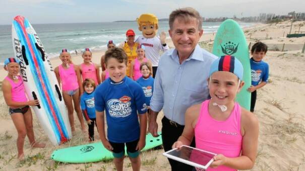 Cr Steve Simpson with Nippers promoting surf safety when he was mayor in 2013. Picture: 