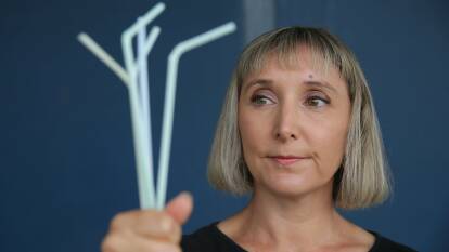 Enviro benefits: Danielle Roll with paper straws, which will become the norm when the plastic variety are banned from November 1. Picture: John Veage