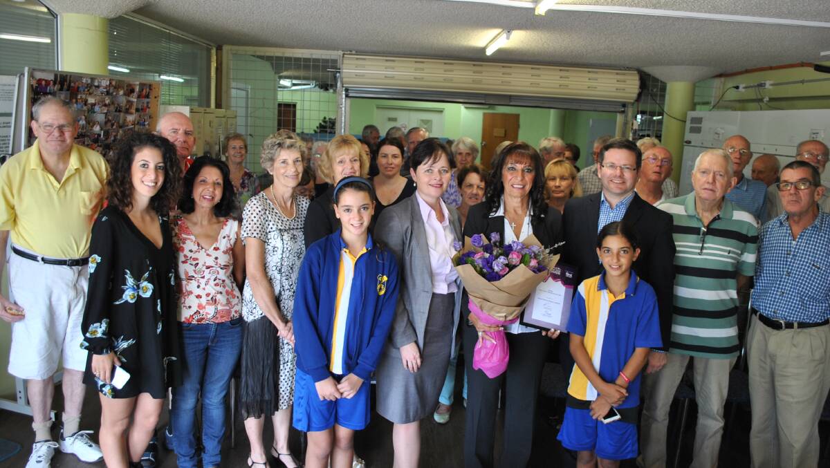 Nahed Soliman with Tanya Davies and Mark Coure, volunteers and family members, including her granddaughters, at the presentation of the 2017 Oatley Woman of the Year Award. Picture: supplied
