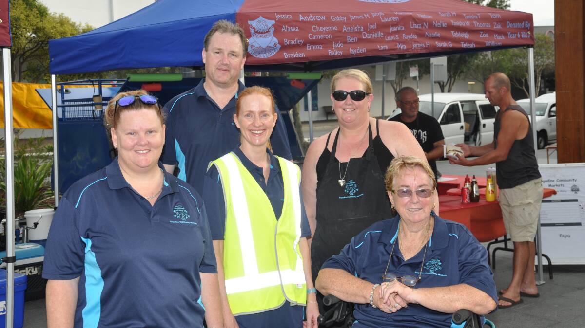 Community minded: P&C volunteers Aleta Schutt (left), Andrew Hare, Fiona Flaherty, Kelly Bilek and Dolly Organ at the Engadine Public School P&C barbecue.
