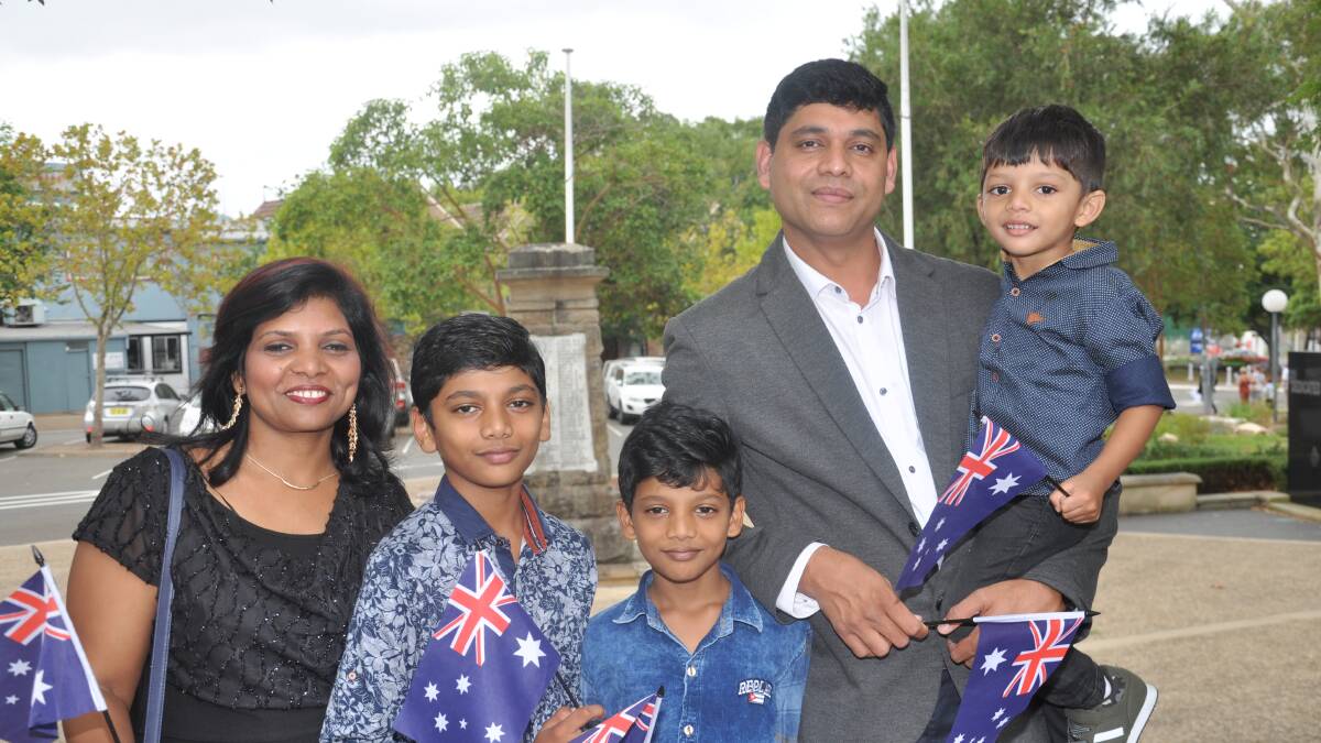 Welcome: Enock and Smita Rathod and their children, Revel, Abien and Immanuel, 3, of Miranda, were among citizenship recipients at the 2018 Australia Day ceremony at Sutherland.