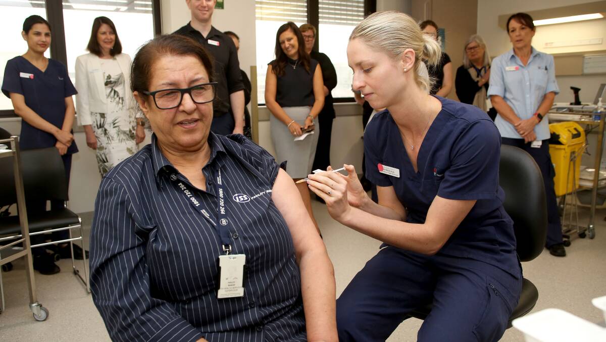Leading the way: Hailey Sharif, cleaning supervisor at St George Hospital, was the first to receive the AstraZeneca vaccine at the St George Hospital vaccination hub in March this year.Picture: supplied