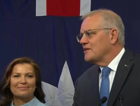 Scott Morrison, with his wife Jenny by his side, concedes defeat.