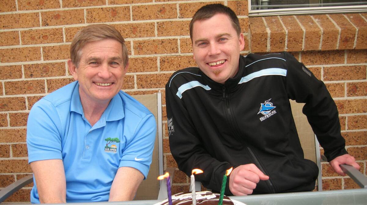 Family shattered: Adam Simpson, a devoted Sharks fan, with his father Steve. Picture: supplied