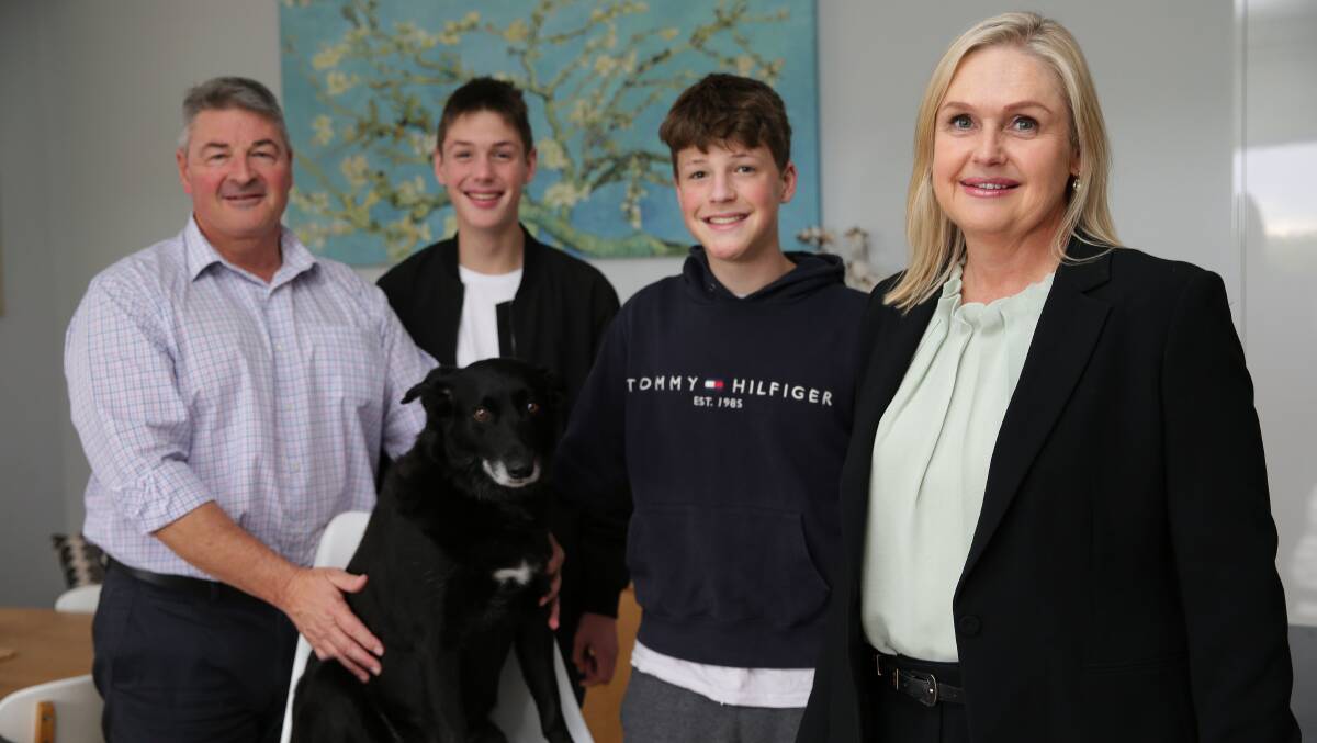 Comfortable win: Newly elected MP for Hughes, Jenny Ware with her husband Michael Oldfield and sons Nick and James and dog Tilley at their Gymea Bay home. Picture: John Veage 
