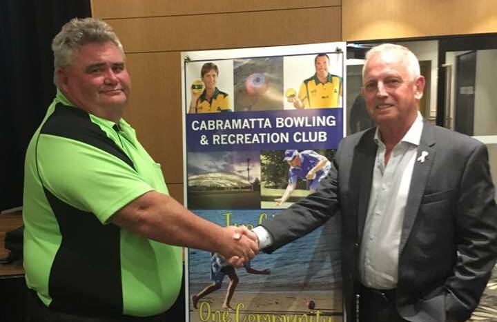 Cabramatta Bowling Club president Michael Morthorpe (left) and Bundeena RSL Memorial Club president Graeme Kelly after the amalgamation was approved by members of both clubs. Picture: Facebook
