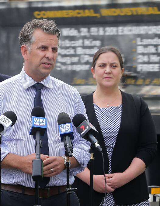 Melanie Gibbons and Roads Minister Andrew Constance at an announcement on Heathcote Road in 2020. Picture: John Veage
