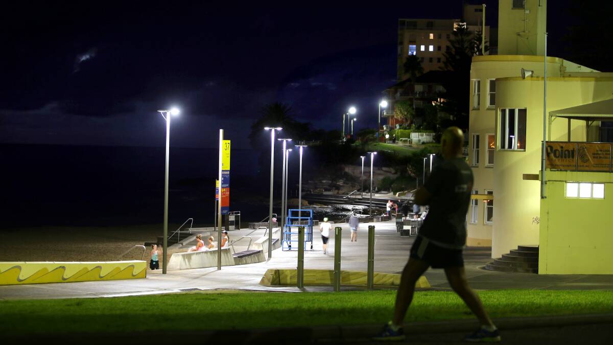 The Esplanade at night is ideal for a walk...until the e-bikes zip by. Picture by John Veage