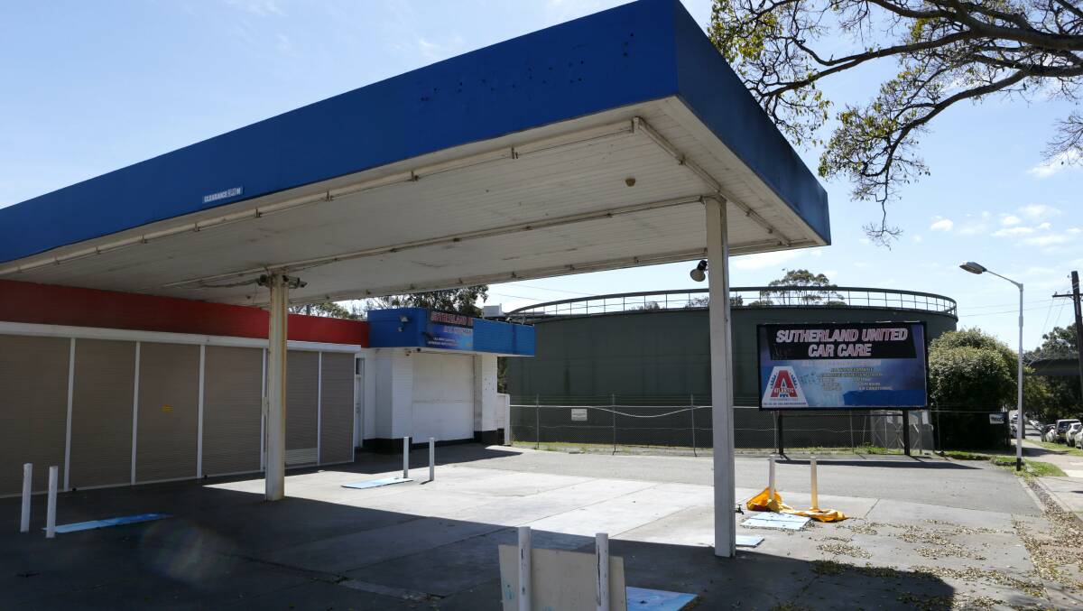 The United Service Station at 1-3 Oxford Street, which is opposite the train line and next to the Sydney Water reservoir, closed this month. Picture: John Veage
