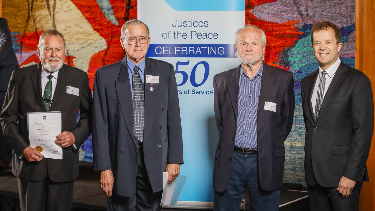 Cronulla electorate JPs, who have served 50 years - Eric Galbraith (left), Terrance Kearns, Attorney-General Mark Speakman and John Adamson. Picture: supplied