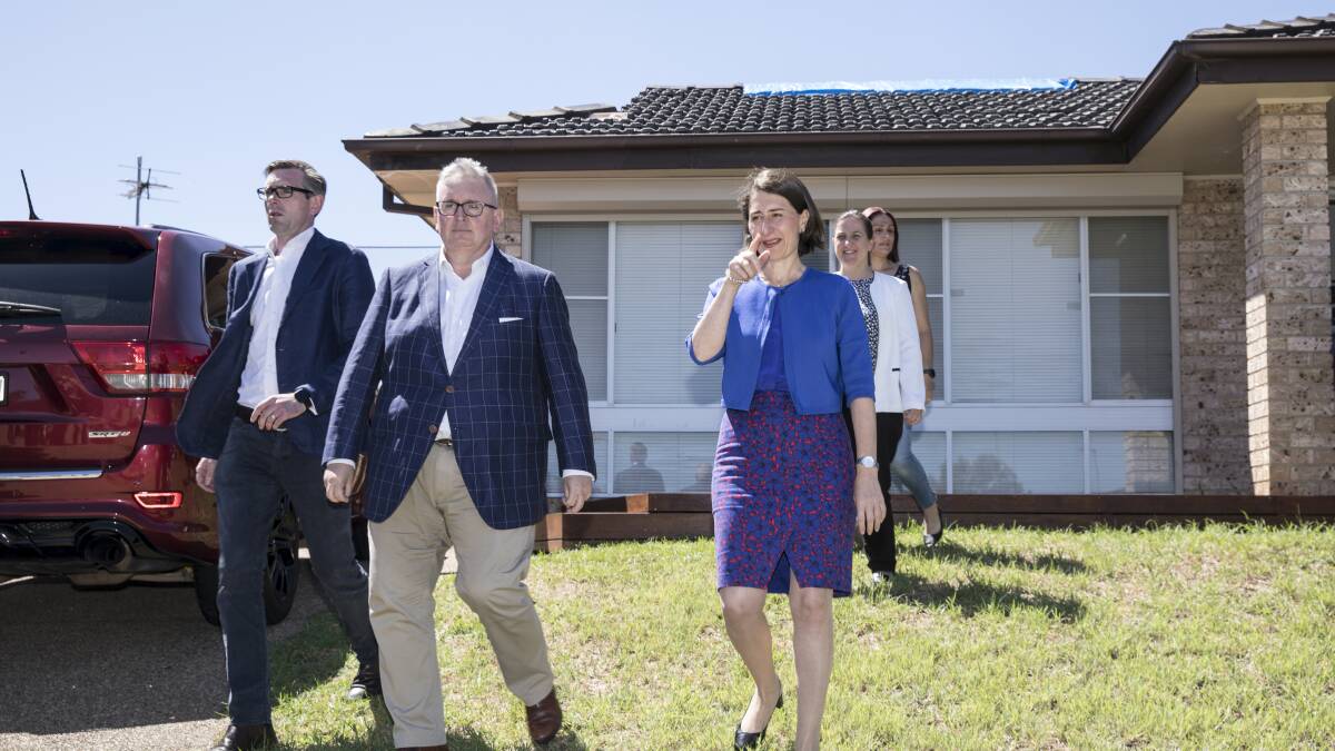 Treasurer Dominic Perrottet, Premier Gladys Berejiklian and Minister for Energy Don Harwin announce the new solar power initiative during the election campaign. Picture: Jessica Hromas 