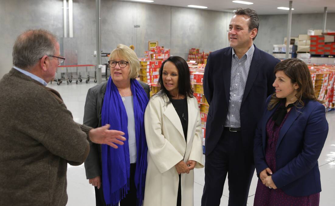 Kogarah visit: Michael Price, chief executive of The Intellectual Disability Foundation of St George, (left) with Jenny Macklin, Linda Burney, Steve Kamper and Sophie Cotsis. Picture: John Veage