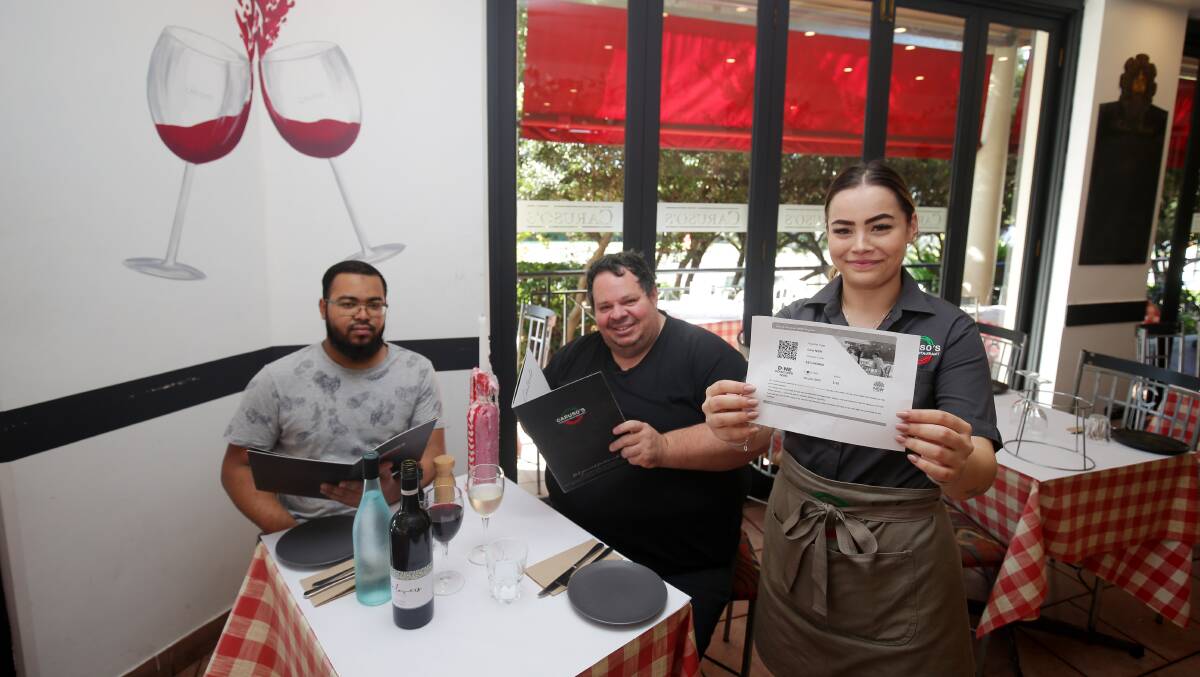 Rocky Pitarelli (centre), Alex Peka and MD Rabby at Caruso's Gymea, which is benefiting from the Dine & Discover NSW scheme. Picture: Chris Lane