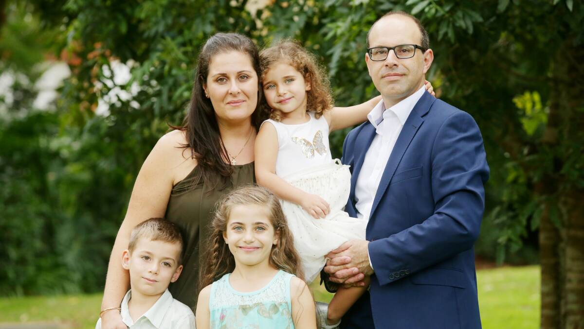 New Liberal MLC Peter Poulos with his wife Vicki and children. Picture: supplied
