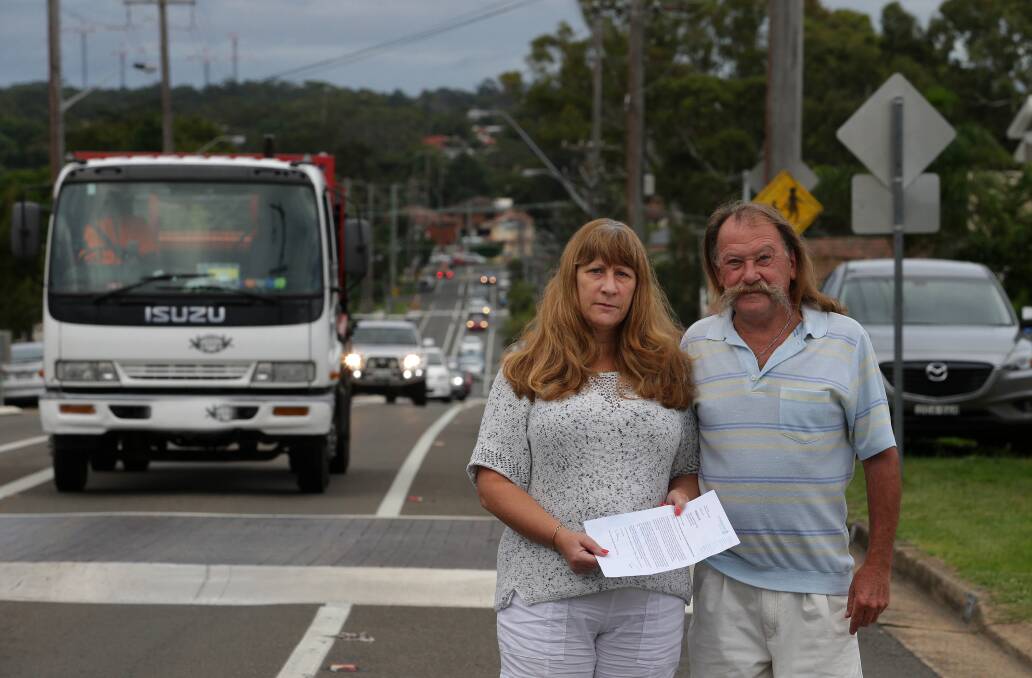 "Blindsided": Sadie and David Mehan with a letter from the council about the proposed supermarket near their Parraweena Road home. Picture: John Veage