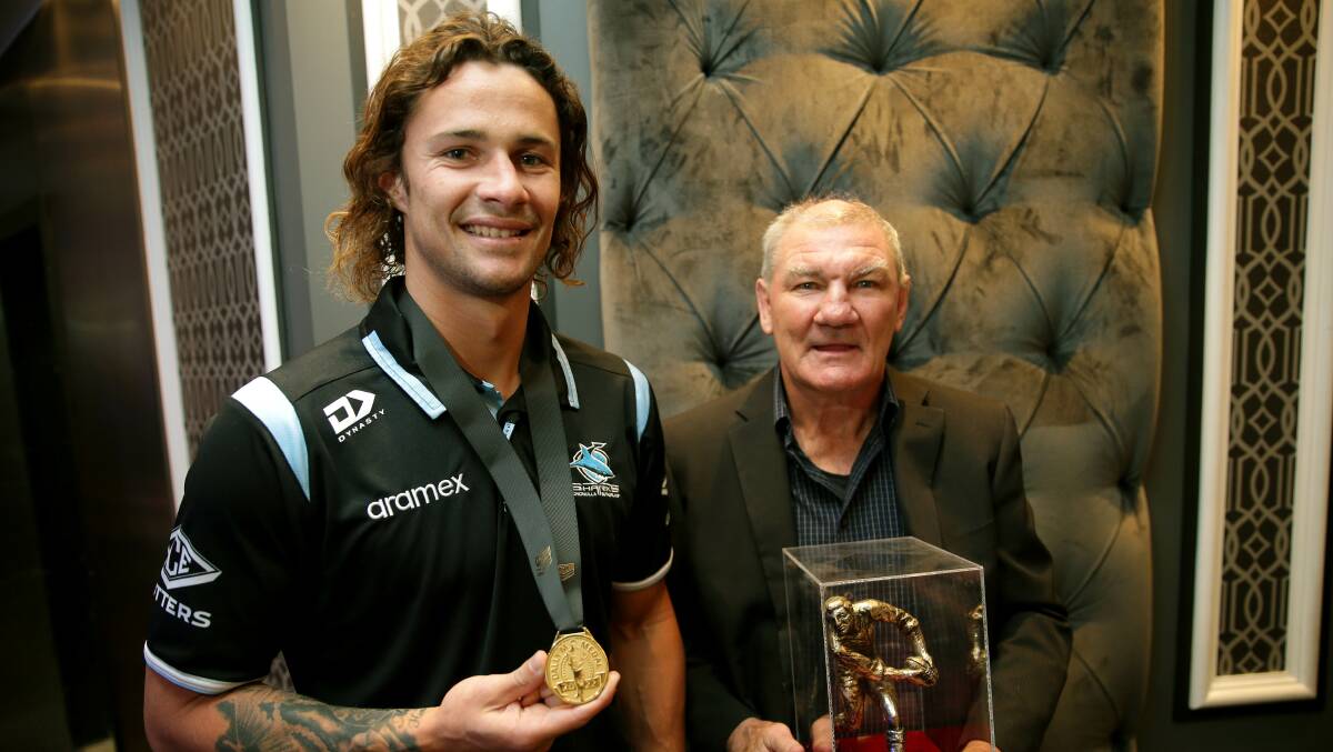 Nicho Hynes with 1989 Dally M Medal winner Gavin Miller at the Sharks' 45th Grand Final luncheon for present and former players. Picture by John Veage 