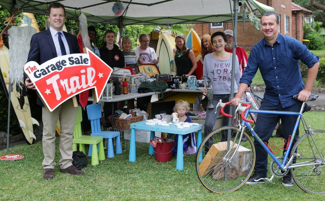Grab a bargain: Mark Speakman, Meili Bookluck, Darryl Nichols and others involved with the Garage Sale Trail at the shire launch of the event, which takes place on Saturday. Picture:John Veage