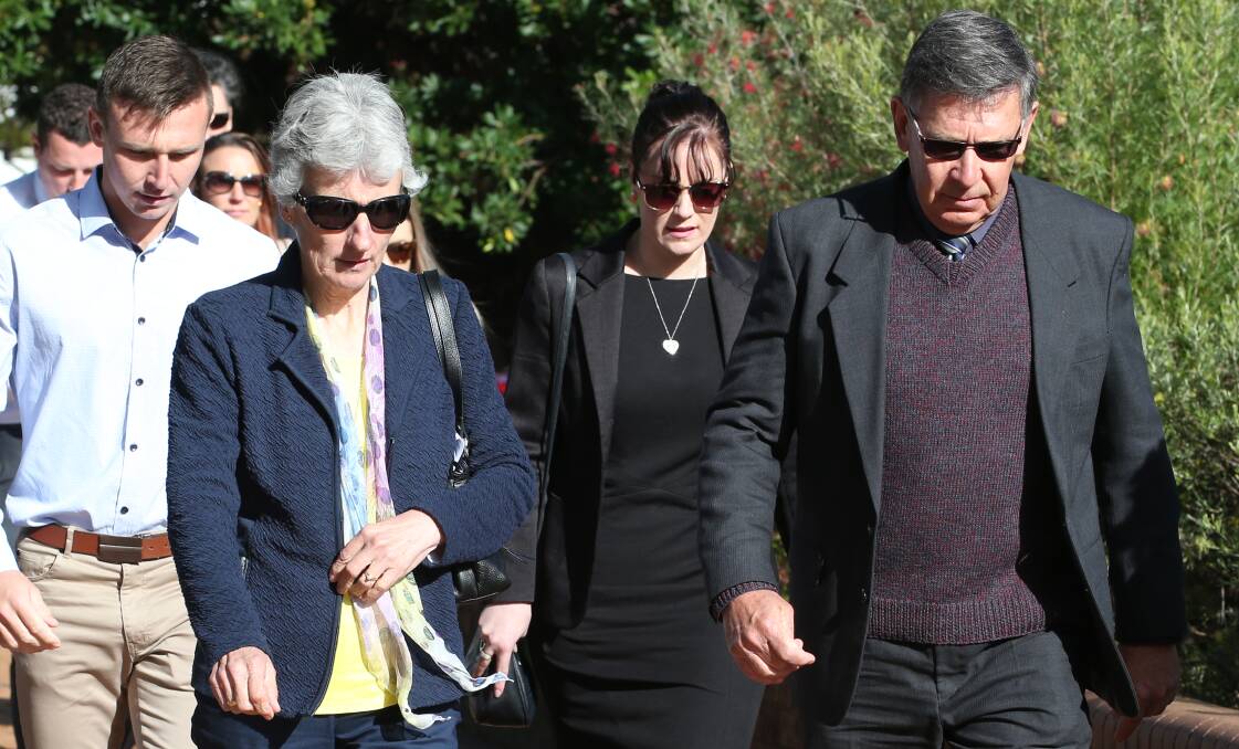 GRIEVING PARENTS: Merrilyn and Bob Scott lead their family into court for Tuesday's sentencing submissions. Picture: Anthony Stipo