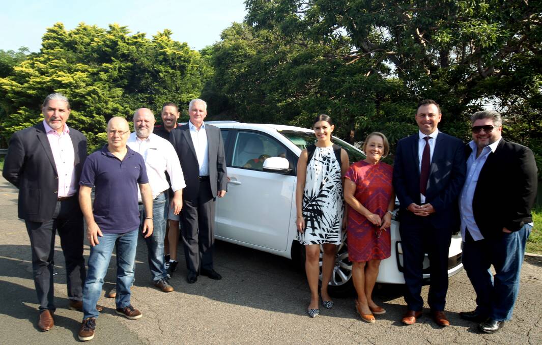 On the move: (left to right) Nick Kharitou , Anthony Anthopoulos, Robert Eyles, Tim Carr and Brod Ivory (Trusted Business Network), Eleni Petinos Miranda MP, Helen Ivory  (BeConnected Community Services), Peter Clout and George Sismondi (TBN). Picture: Chris Lane