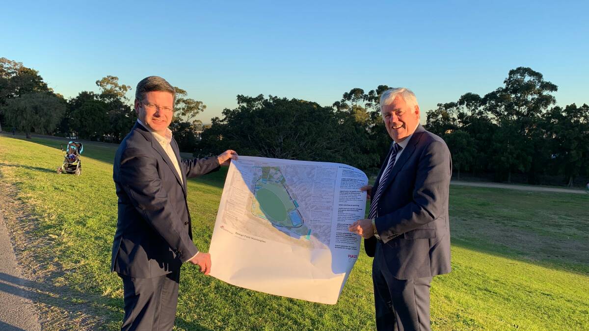 Field of funds: Oatley MP Mark Coure and Georges River Council mayor Kevin Greene with the upgrade plan at Kempt Field, Hurstville.