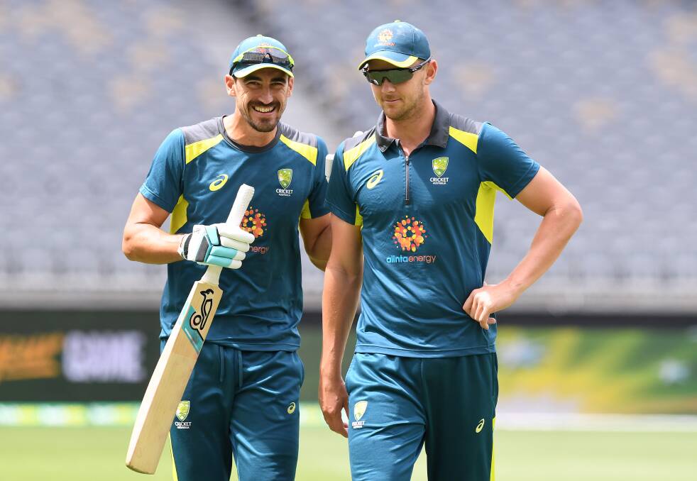Josh Hazlewood (right) is expected to claim James Pattinson's place in the XI, although captain Tim Paine insists Mitchell Starc is still in the mix to face England in the second Test. Picture: AAP