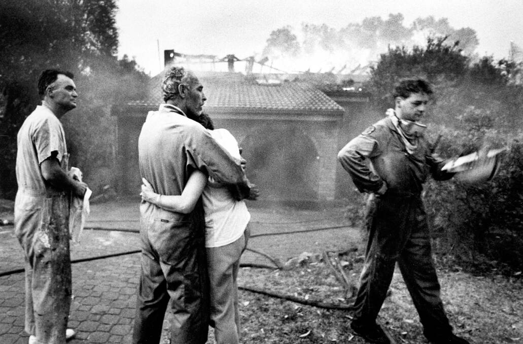 The anguish of a couple in Yates Road, Bangor, was repeated many times over as bushfires swept through the shire in January 1994. Picture: Jason Hamilton