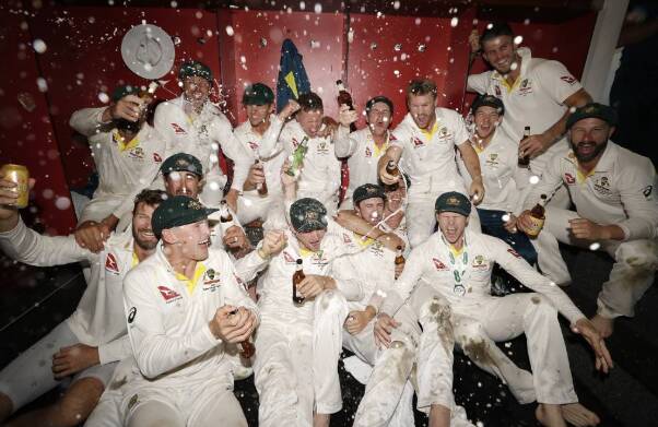 The Australian Cricket Team celebrate in the change rooms after Australia claimed victory to retain the Ashes. Picture: Getty Images