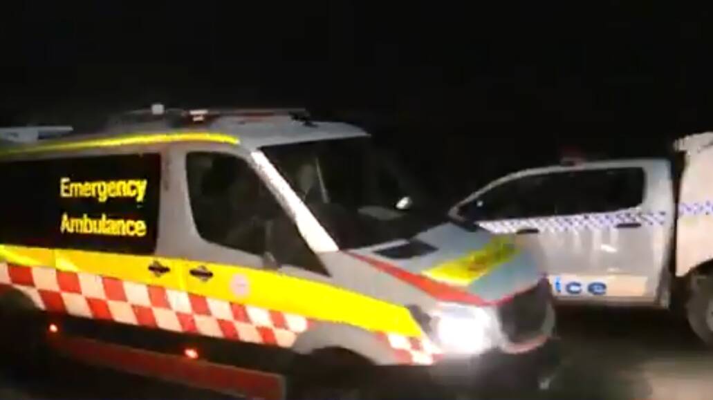 Police and emergency services on the scene at Como on Tuesday night where a man died when the car he was driving crashed on to train tracks. Pictures: 7News