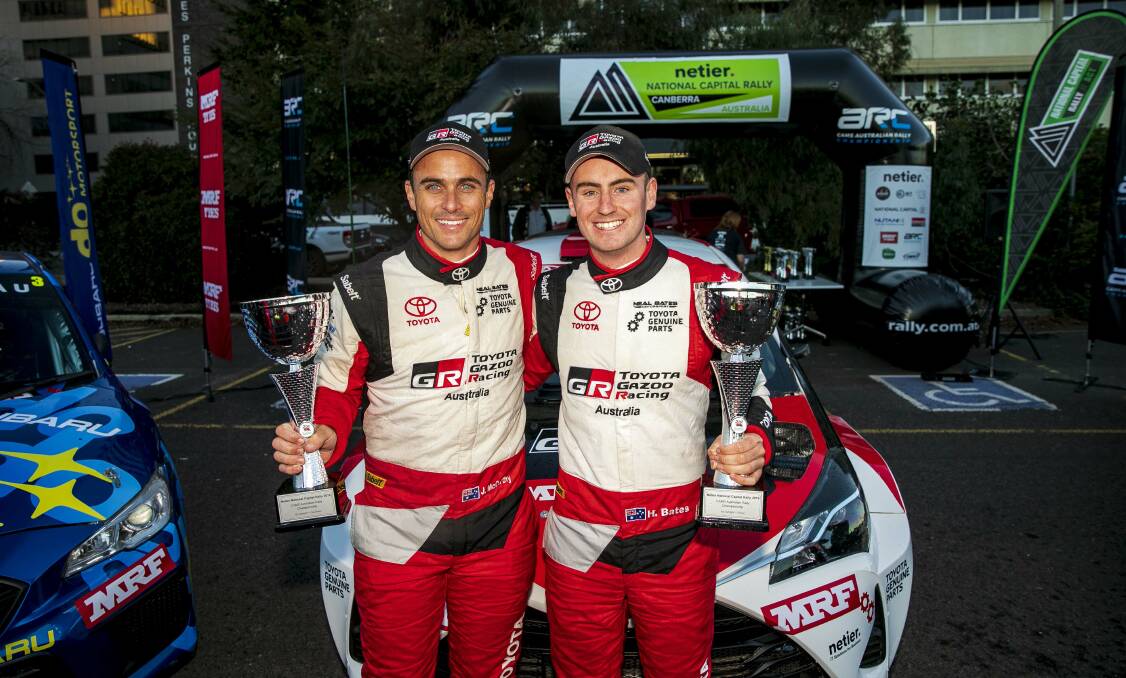 Harry Bates and co-driver John McCarthy celebrate victory in the Canberra leg of the Australian Rally Championship. Picture: Jack Martin