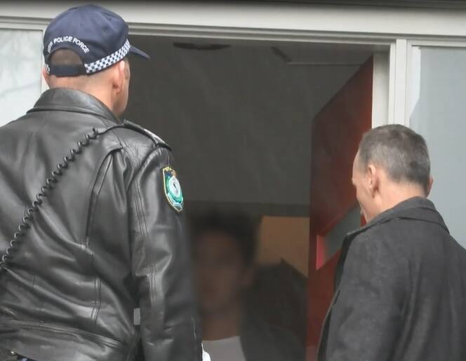 Paul Frost being arrested last week on alleged historical sexual assaults. Pictures: NSW Police