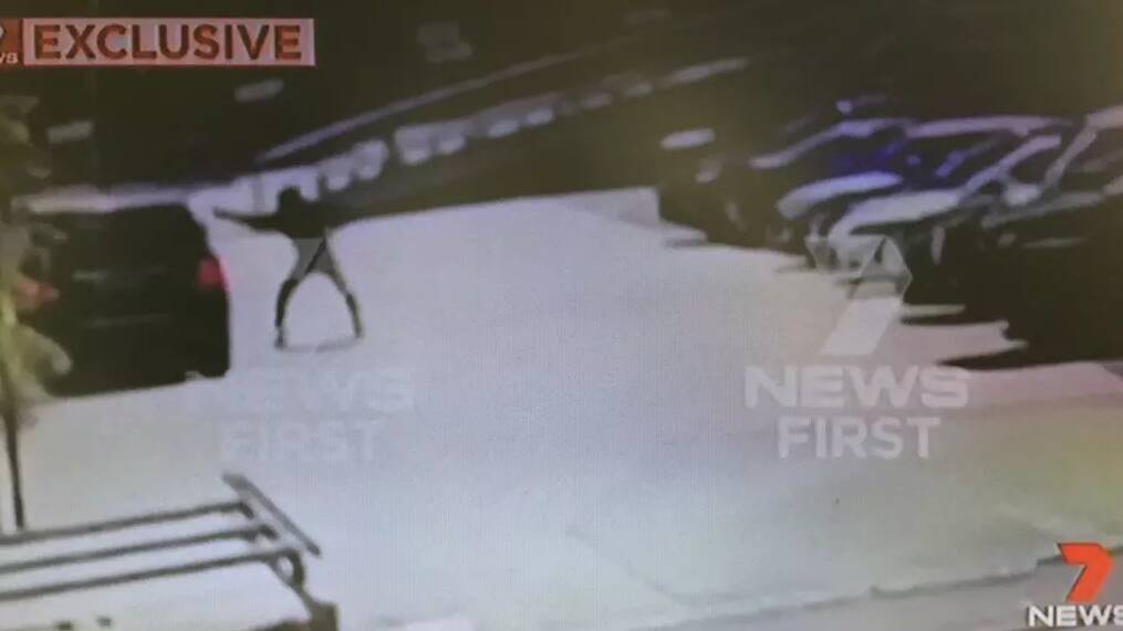 Footage shows the balaclava-clad gunman firing a barrage of bullets into the driver's side window of Hawi's car outside a Rockdale gym. Picture: Seven News
