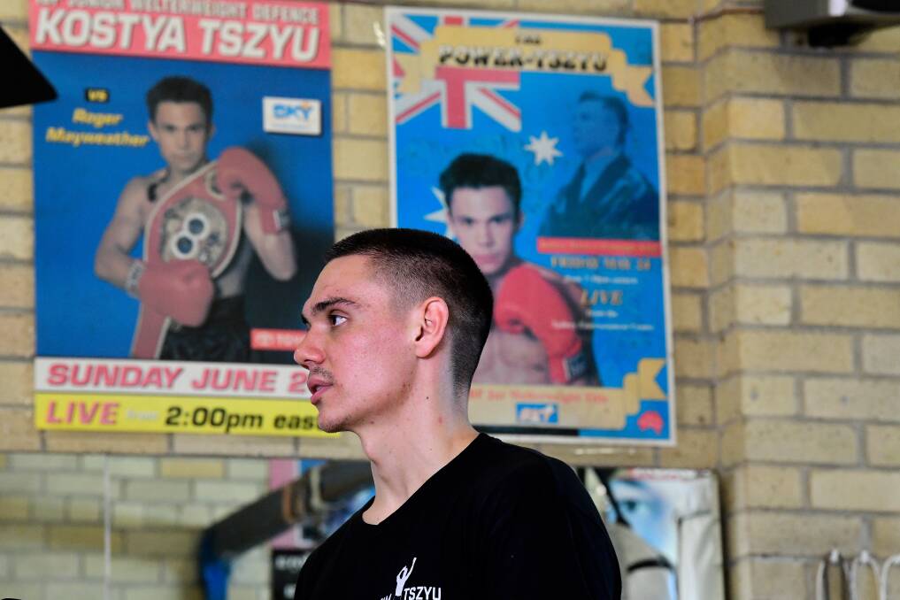 Tim Tszyu at the Tszyu Boxing Academy in Rockdale surrounded by giant posters promoting his father's bouts. Picture: Bianca De Marchi, AAP