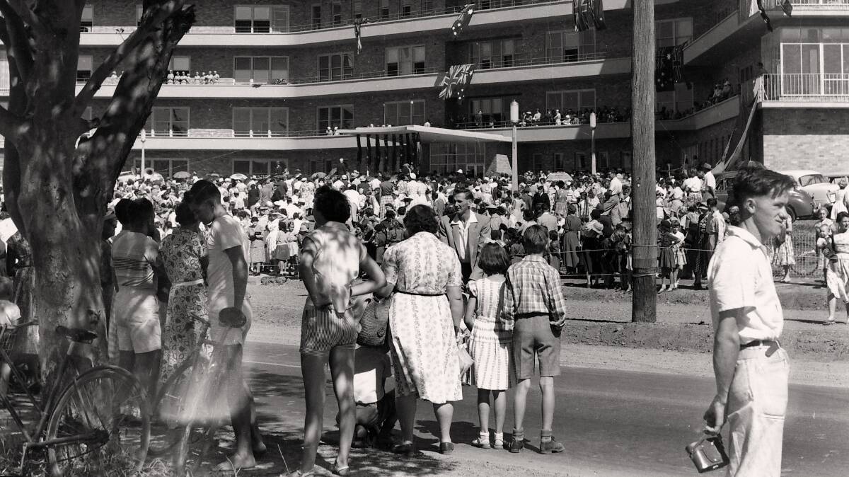 Big day in the shire: Crowds celebrate the opening of Sutherland Hospital, with its distinctive verandahs, in 1958.