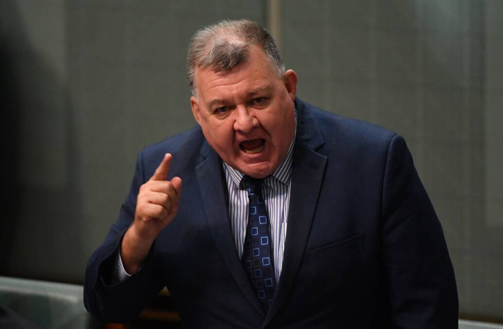 "Rescued": Craig Kelly, speaking in federal parliament on Monday, has been spared a preselection contest for his seat of Hughes after he allegedly threatened to run as an independent. Picture: Mick Tsikas, AAP