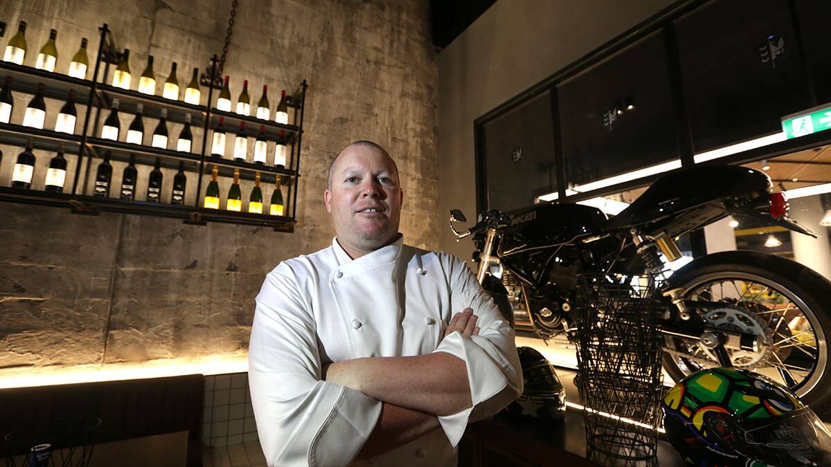 Happier times: Executive chef Damien Braisel at Criniti's restaurant on opening day at South Village shopping centre last November. Picture: John Veage