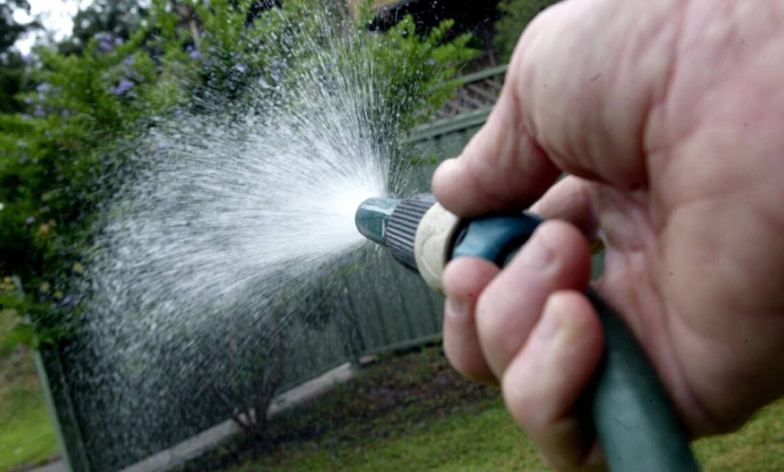 Tougher rules: Watering gardens with a hose will be banned from December 10 when Level 2 restrictions start. Picture: Adam McLean