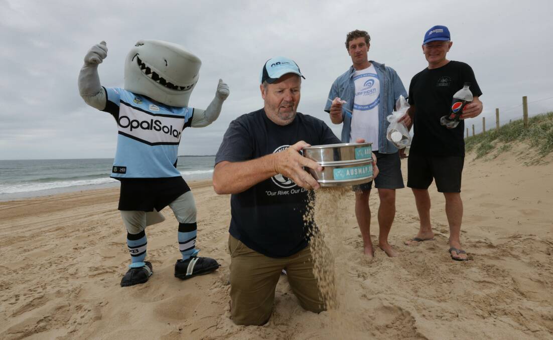 Cleaner oceans: Riverkeeper Tony Wales (front) Mr Sharkie and Surfrider Foundation’s Joe Glendening and Andy Britton promote the Clean Up Up Cronulla day.