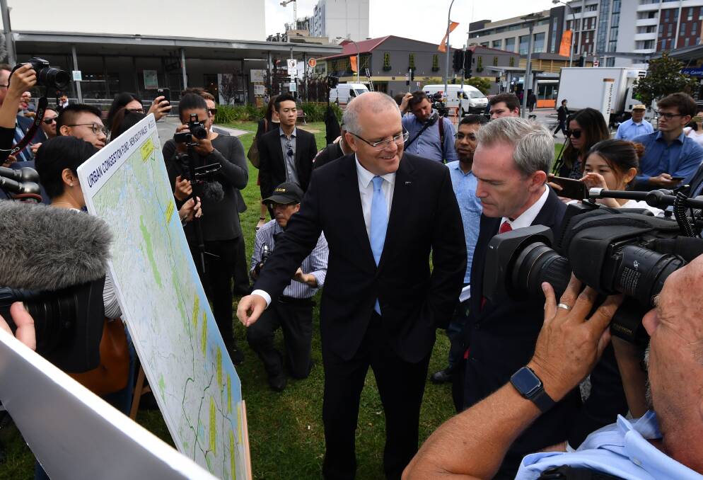 Road toll: Scott Morrison with Banks MP and Minister for Immigration, David Coleman (right), in Hurstville, announcing $250 million of "congestion-busting funding". 