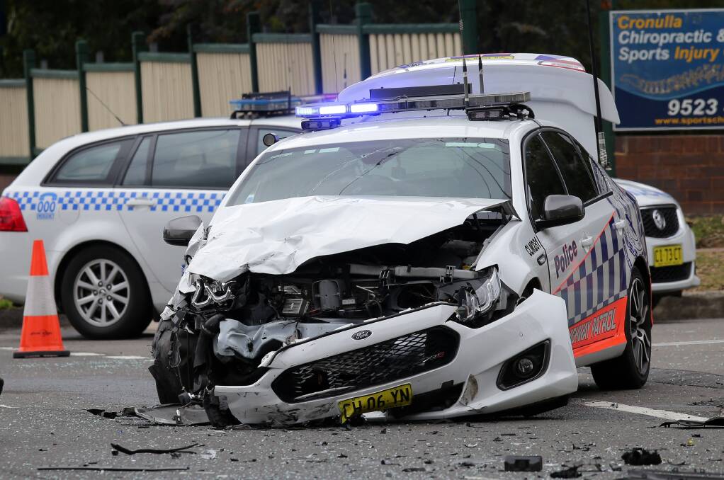 A woman remains in a critical condition in St George Hospital hospital following a collision between her Mercedes and a highway patrol car at Croinulla on Wednesday. Pictures: John Veage
