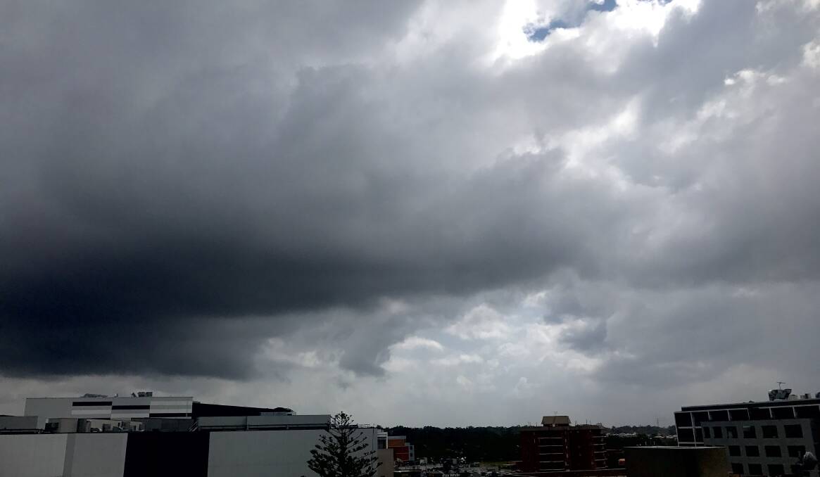 Rain clouds on the horizon: The view looking west from Westfield Miranda rooftop car park on Thursday afternoon. Picture: Chris Lane