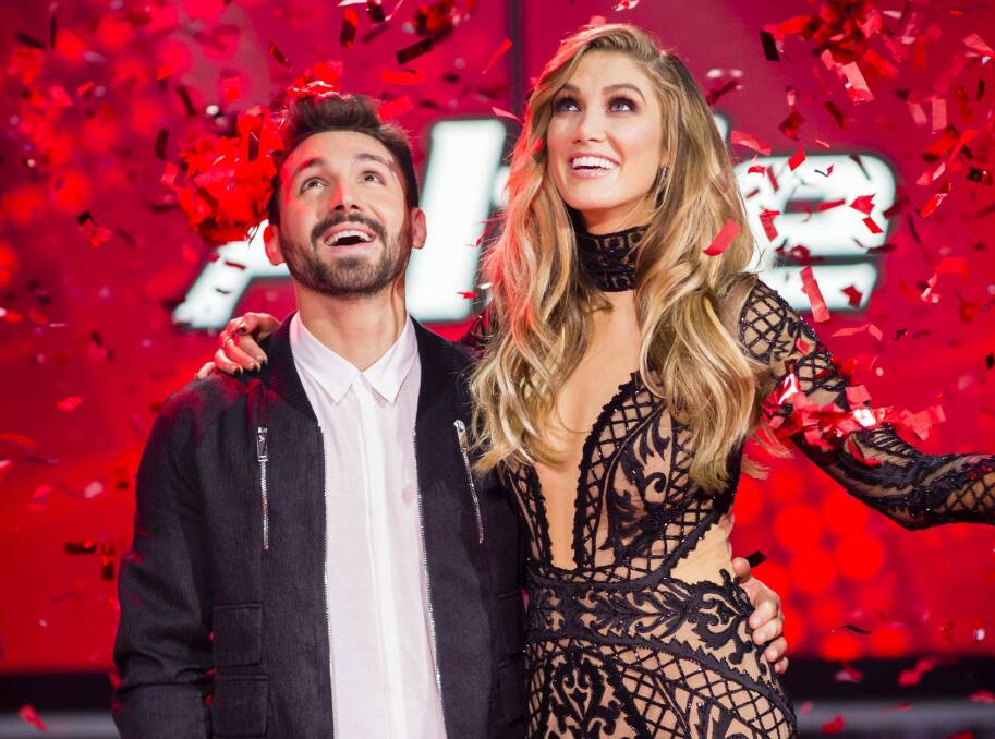 Winner of The Voice Australia 2016 grand finale, Alfi Arcuri, with his coach and mentor Delta Goodrem. Arcuri will provide the entertainment at the St George Local Business Awards at Sharks Leagues.  

