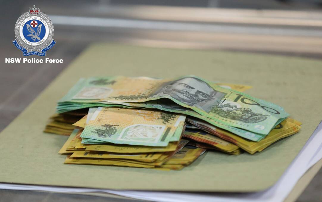 Some of the cash seized under Strike Force Petrie during the execution of search warrants on a number of Sydney premises. Picture: NSW Police