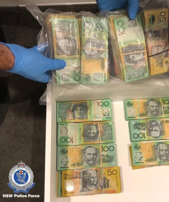 During the March 2019 raid, police seized $360,000 in cash. Picture: NSW Police