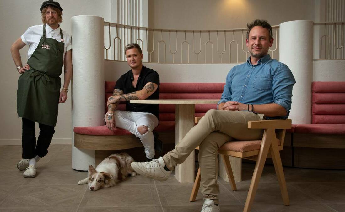 Rapid growth: The Light Years team managing director James Sutherland (right), creative director Kim Stephen, chef Robbie Oijvall, and Milla the dog at the new Newcastle venue. Picture: Marina Neil