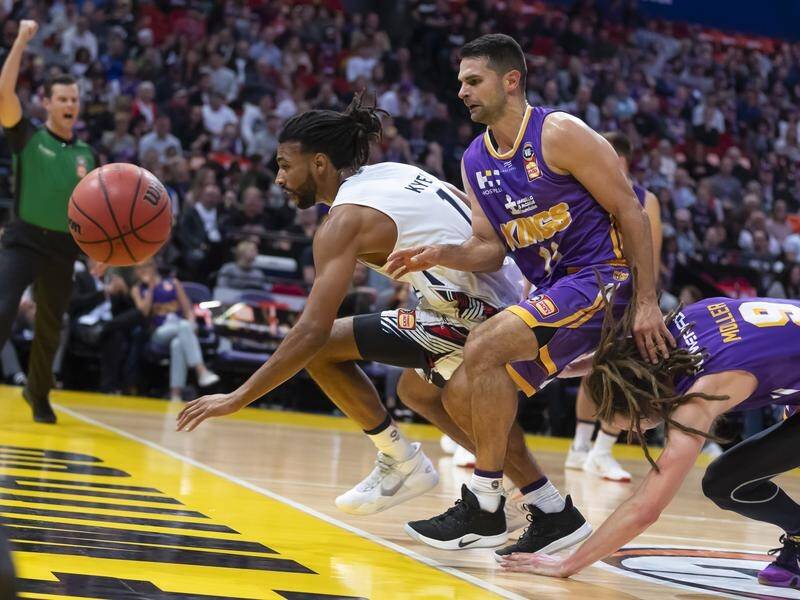 Sydney Kings' Kevin Lisch (c) was injured in their NBA win over Adelaide 36ers at Qudos Bank Arena.