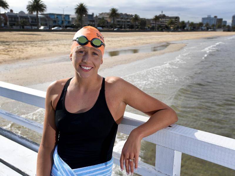 Australian swimmer Chloe McCardel has beaten the men's record for swims across the English Channel.