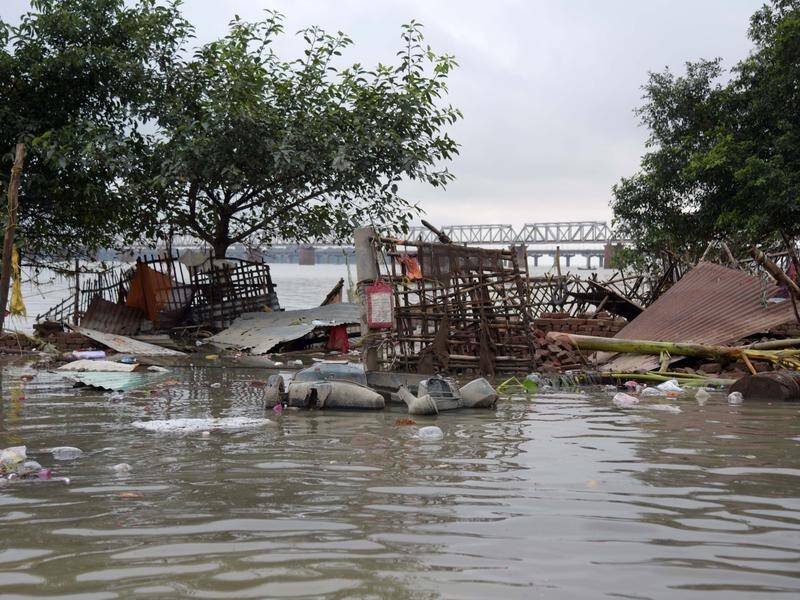 The death toll in northern India from torrential flooding has reached 120, with more rains to come.