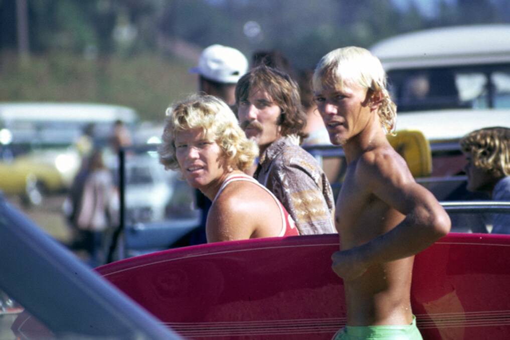 Local links: 1972 world champion surfer Peter Townsend (pictured above right at the 1972 Duke Kahanamoku Hawaiian Surfing Classic) will celebrate 100 years of surfing.
